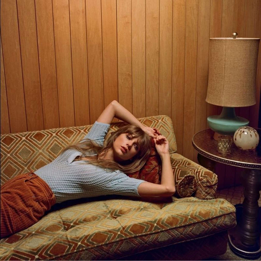 Taylor Swift in an image from her album 'Midnights' showcasing her evocative and dreamy aesthetic.